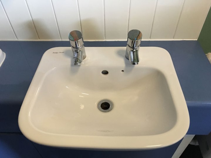 really annoying sink with one faucet for hot water and another for cold in many places in England